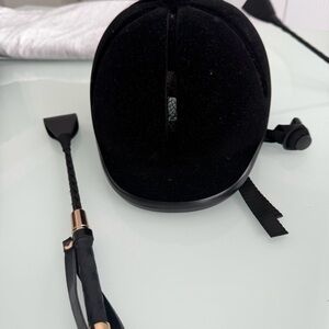 Riding helmet and whip